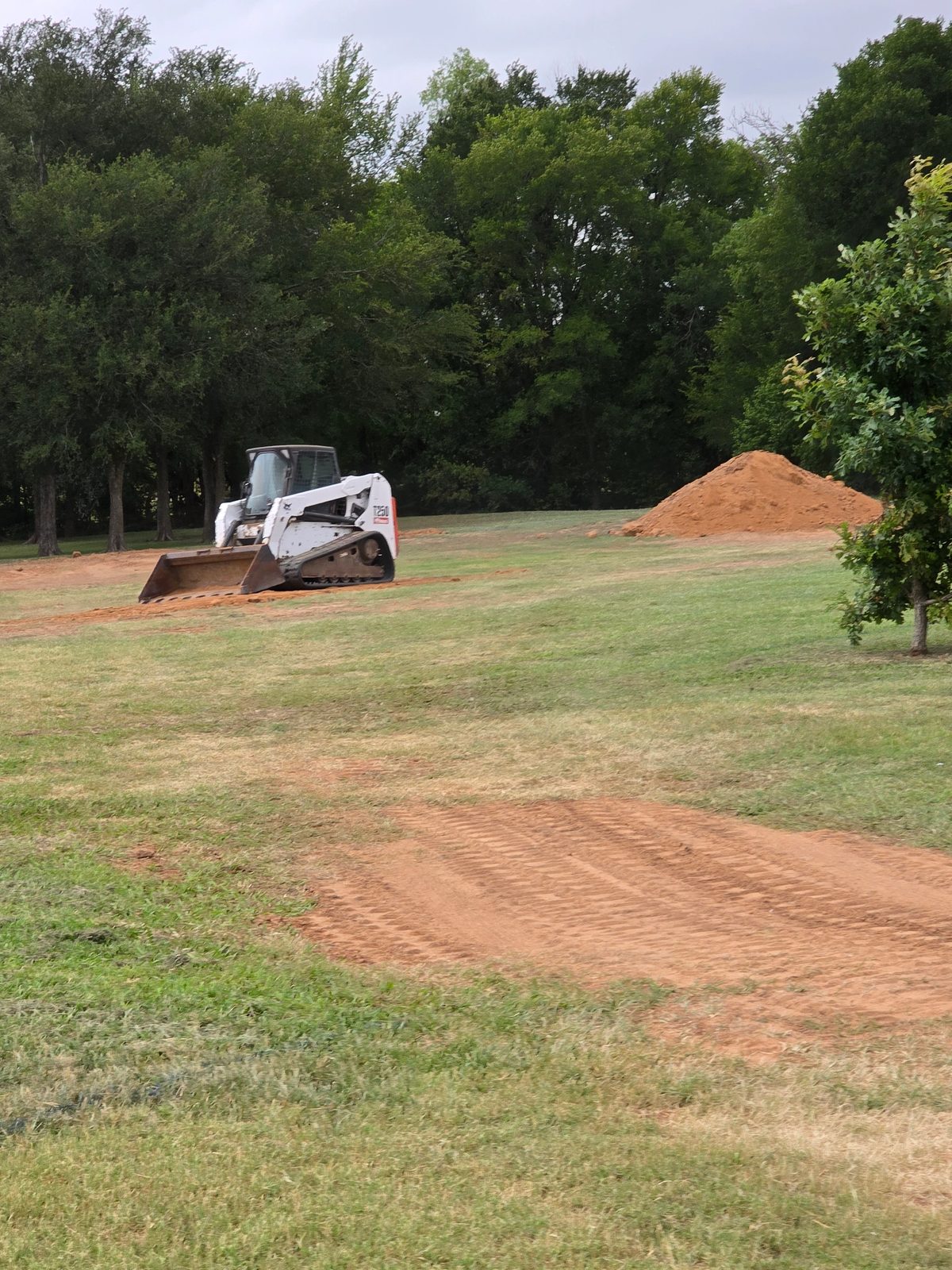 Finished pad and driveway work